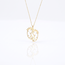Gouden collier met open babyvoetjes