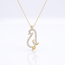 Gouden collier met pinguïn hanger