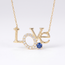 Gouden love collier met zirkonia en blauwe steen