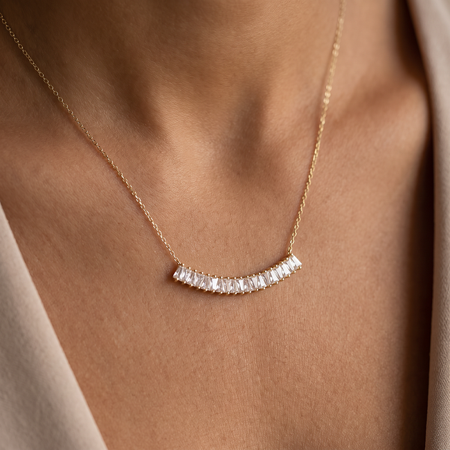 Gouden collier met baguette geslepen zirkonia rij