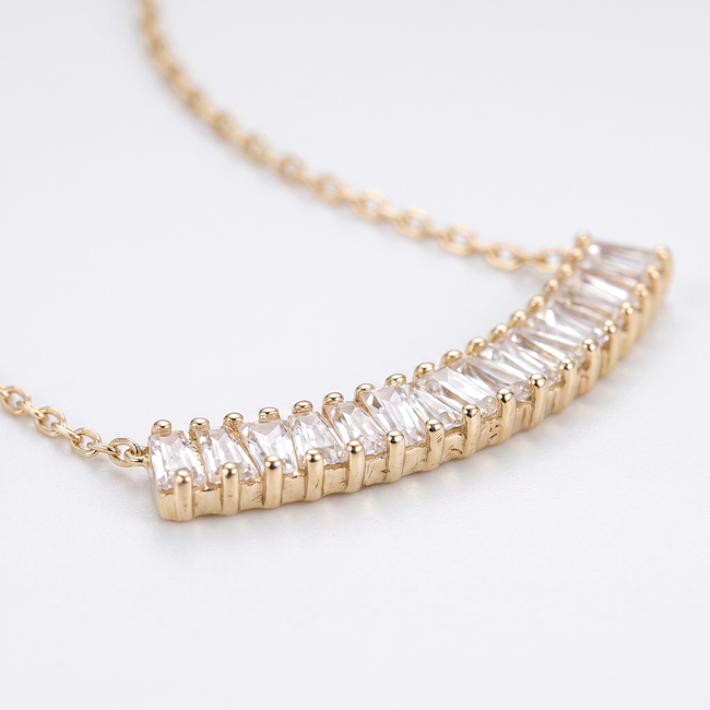 Gouden collier met baguette geslepen zirkonia rij