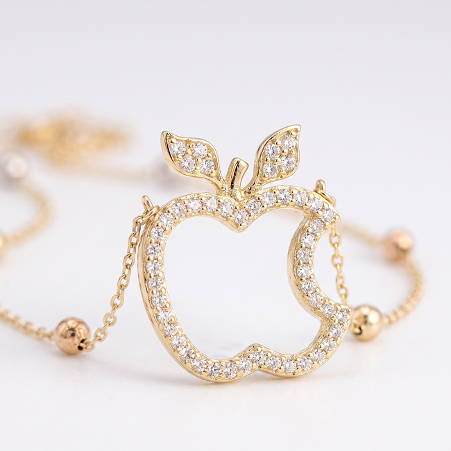 Gouden collier met appelhanger en zirkonia
