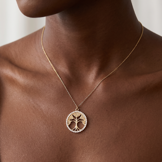 Gouden collier met levensboom hanger en zirkonia