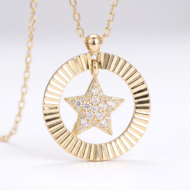 Gouden collier met geribbelde ster hanger