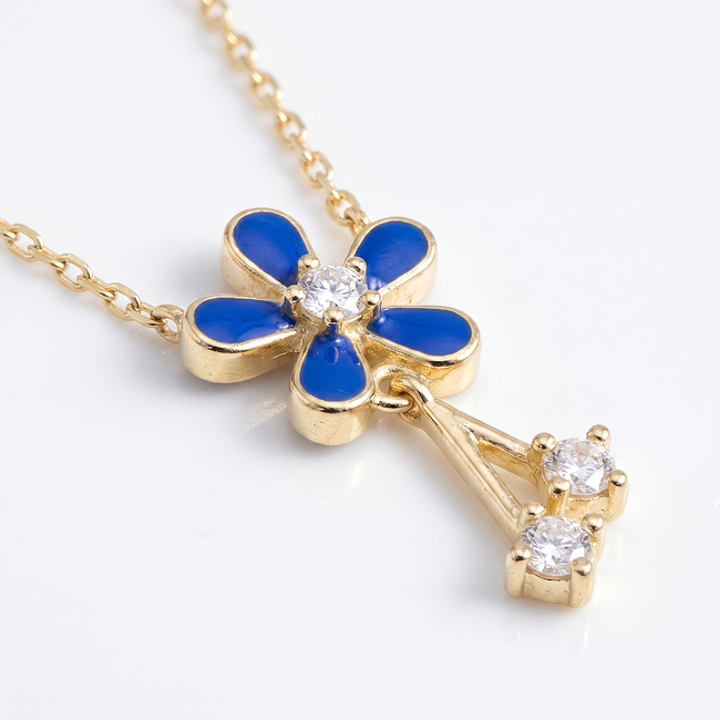Gouden ketting met blauwe bloemhanger