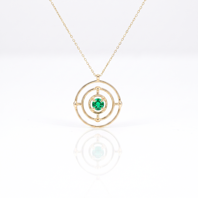 Gouden collier met moderne zonvormige hanger