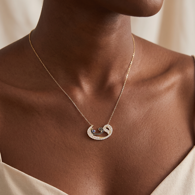 Gouden ketting met Arabische letter en zirkonia