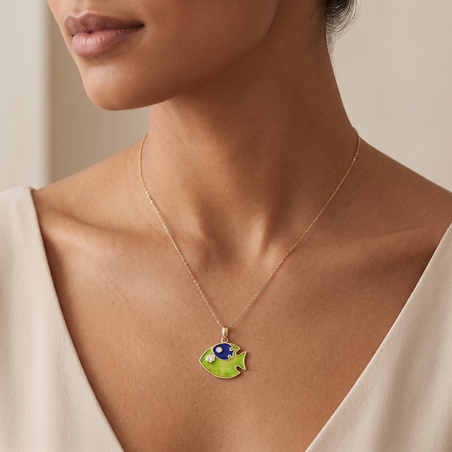 Gouden kinderketting met kleurrijke vissenhanger