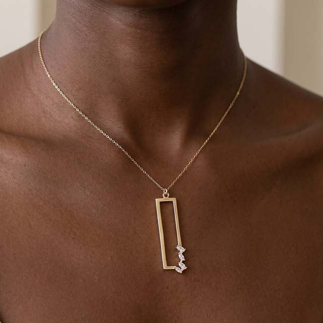 Gouden collier met open rechthoek hanger