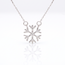 Witgouden sneeuwvlokhanger met 0,10 ct diamanten