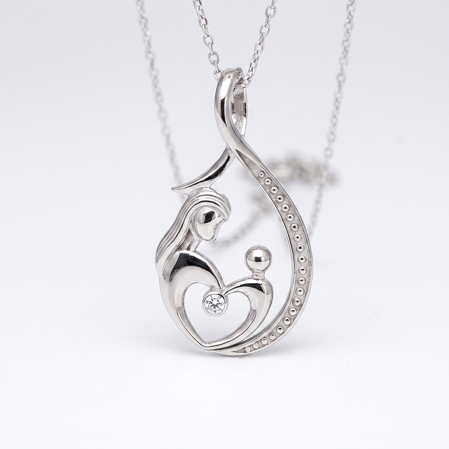 Witgouden moeder en kind collier met diamant
