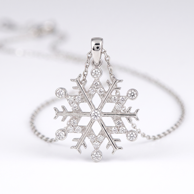 Witgouden sneeuwvlok collier met 0,11 ct diamant