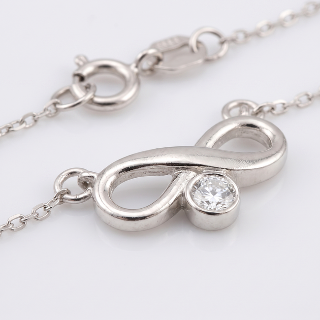 Witgouden infinity collier met briljant