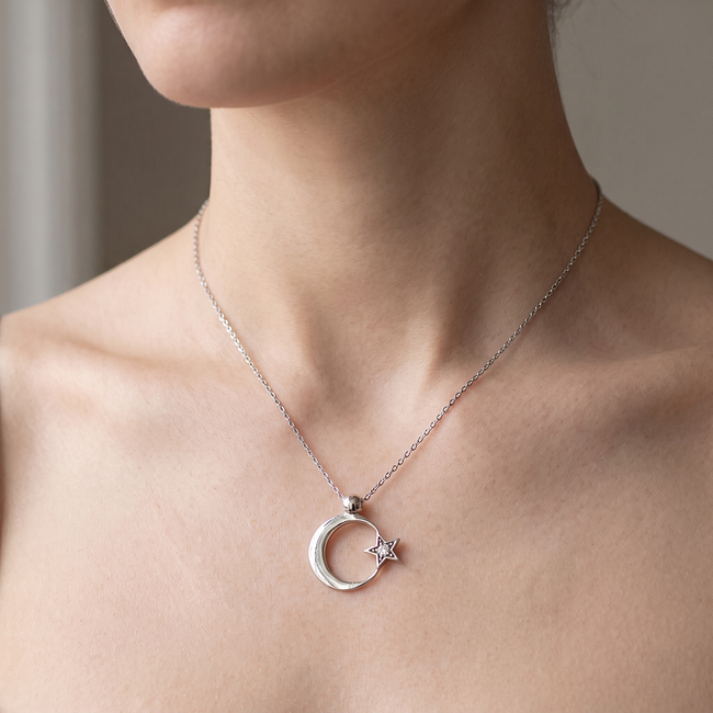Maan en ster hanger van witgoud met diamant