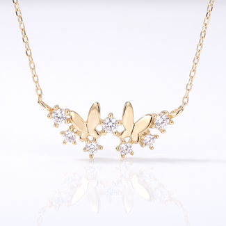 Gouden collier vlinders met stenen