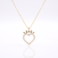 Gouden collier open hart met steentjes