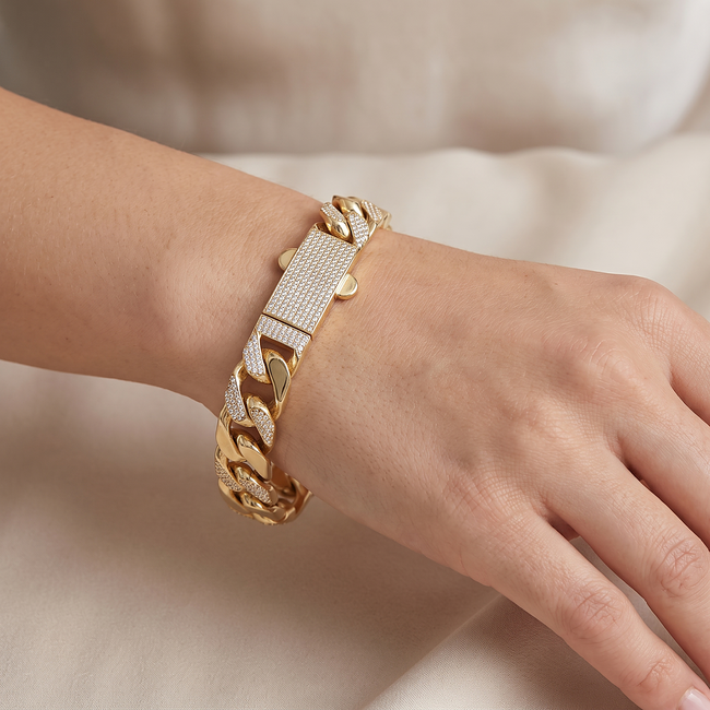 Luxe gouden schakelarmband met zirkonia 23 cm
