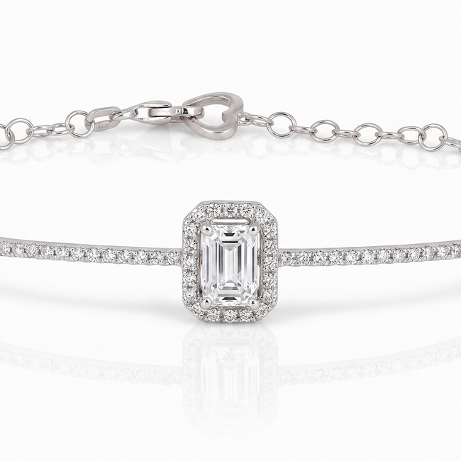Witgouden armband met emerald cut diamant