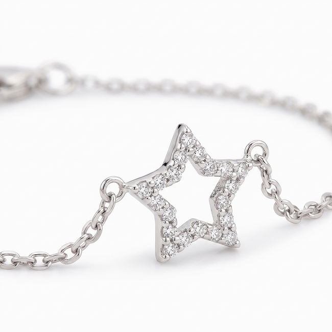Witgouden armband met open ster en pavé diamanten