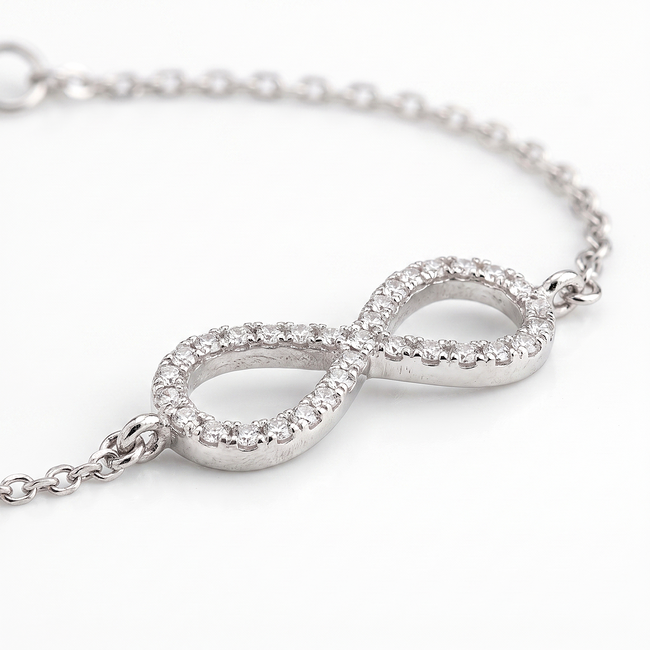 Witgouden armband met pavé infinity en diamanten