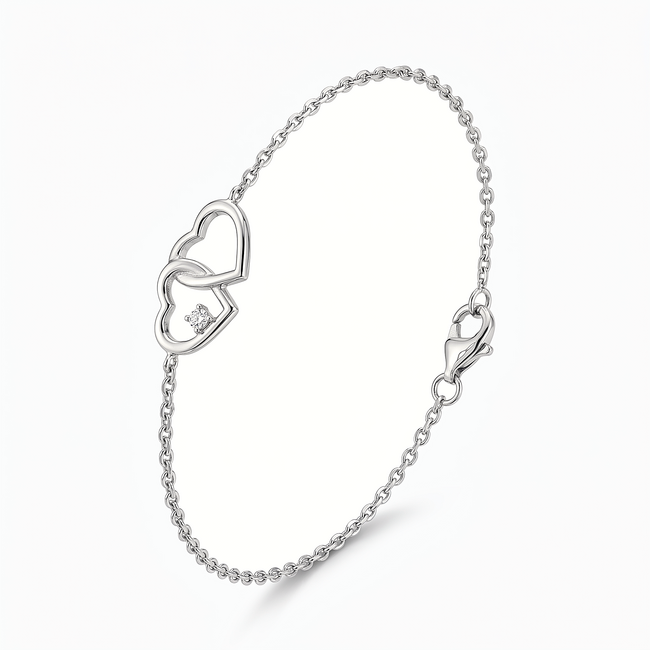 Witgouden armband met dubbele hartjes en diamant