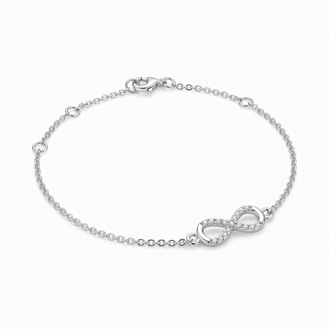 Fijne witgouden infinity armband met diamanten