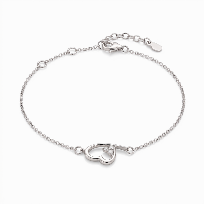 Witgouden armband met open hart en diamant detail