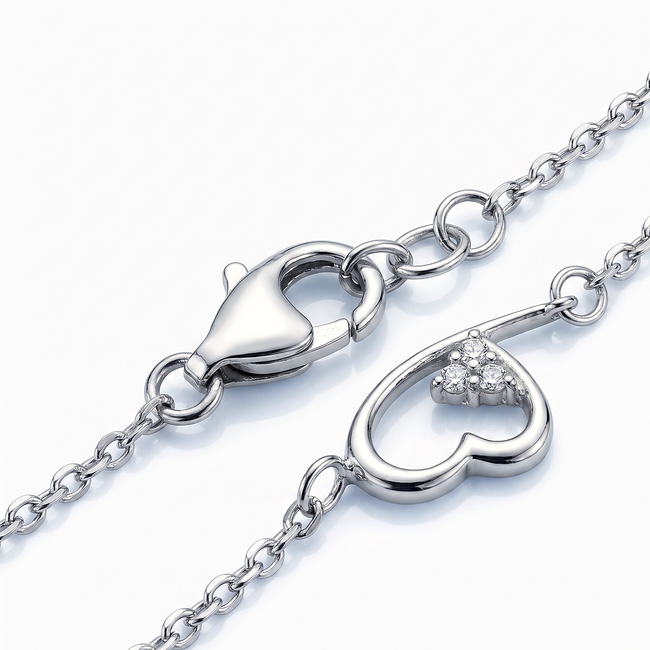Witgouden armband met open hart en diamant detail