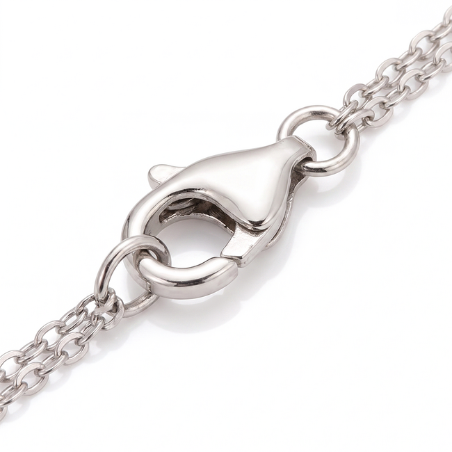 Witgouden infinity armband met saffier en diamant