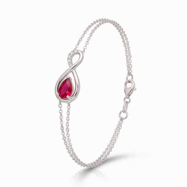 Witgouden infinity armband met robijn en diamant