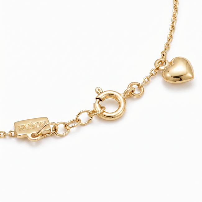 Gouden hartjes armband 14 karaat met love in sierletters