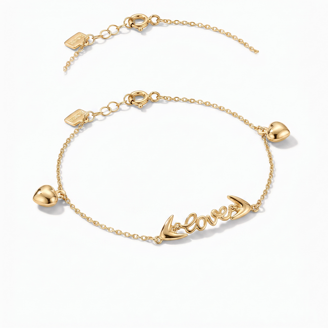 Gouden hartjes armband 14 karaat met love in sierletters