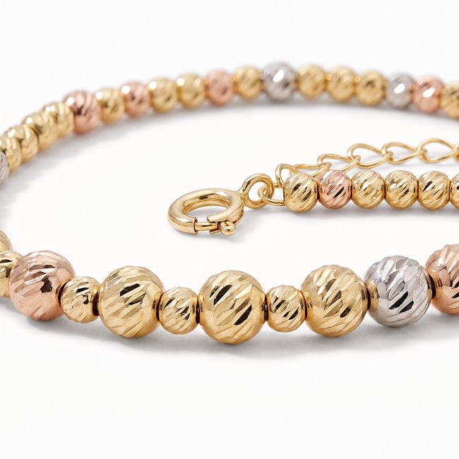 Gouden dorika armband 14 karaat tricolor met geslepen bolletjes