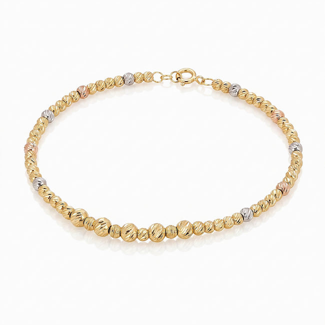 Gouden dorika armband 14 karaat tricolor met geslepen bolletjes