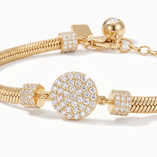Gouden slangenarmband 14 karaat met rond middenstuk vol zirkonia