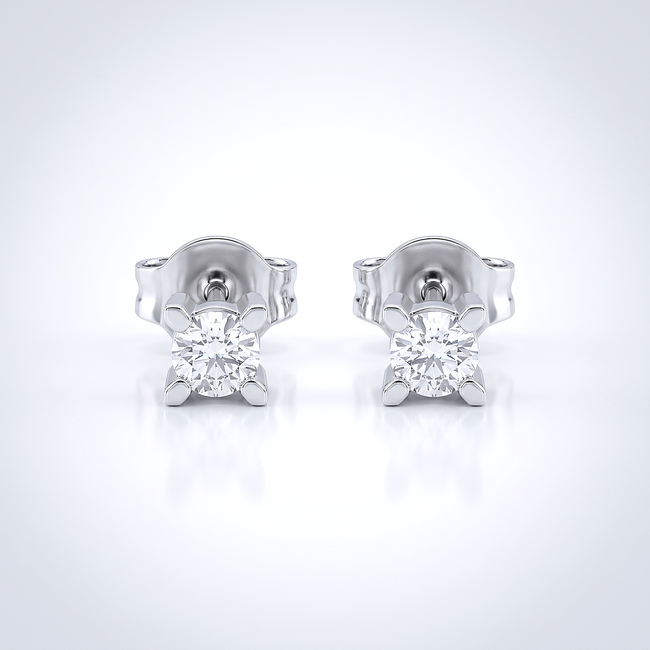 Witgouden oorstekers met solitaire diamanten