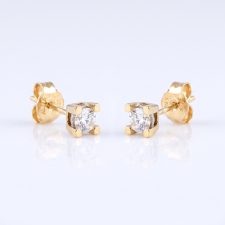 Gouden diamanten oorstekers
