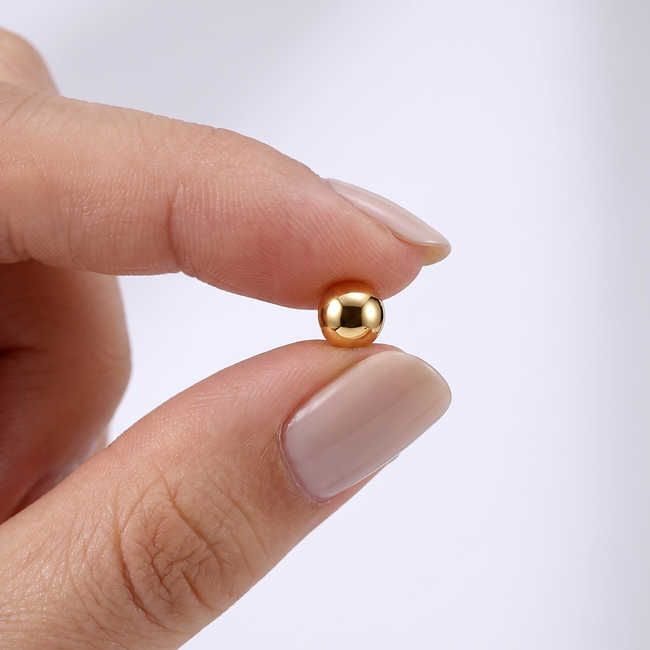 18 karaat gouden bol oorbellen 5.5 mm