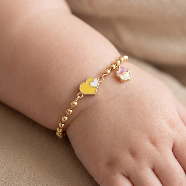 Kinderarmband met hartje en roze vlindertje