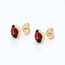 Gouden oorknoppen met rood lieveheersbeestje