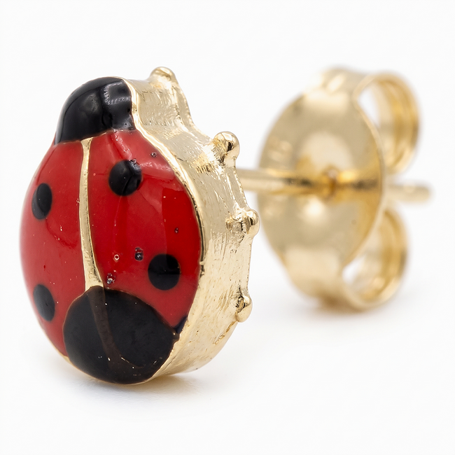 Gouden oorknoppen met rood lieveheersbeestje