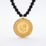 Zwarte kralenketting met siergouden accenten