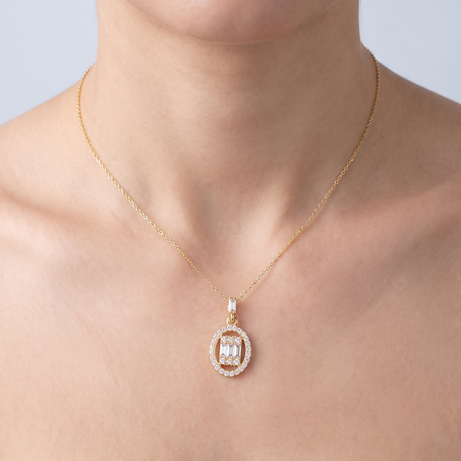 Gouden collier ovaal medaillon baguette zirkonia 42 cm
