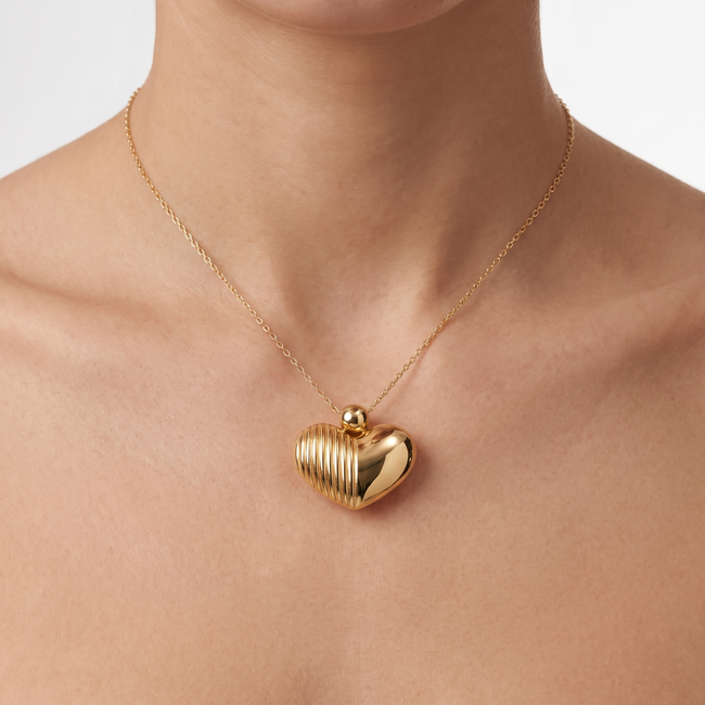 Gouden collier hartjes bolvormig geribbeld 45-50 cm