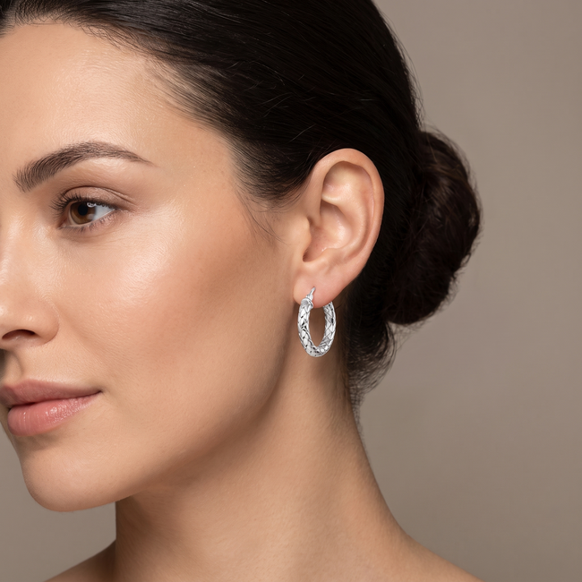 Grote Zilveren Gevlochten Creolen Dames 4 mm Breed