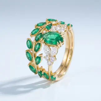 Gouden Ring met Smaragd en Diamant Bladermotief