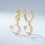 Gouden Creolen 14 Karaat met Gouden Ster en Zirkonia Maansikkel, 9,7 mm