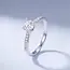 Witgouden solitair ring met 0,50 ct diamant en pavé band