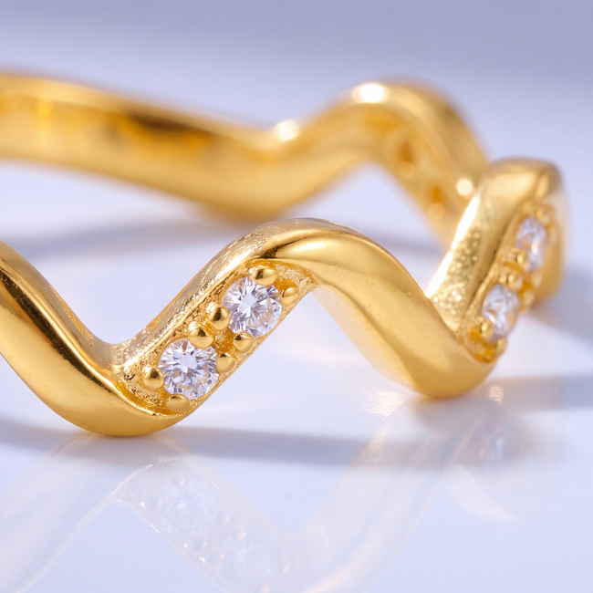Roodgouden wave ring 22 karaat met zirkonia