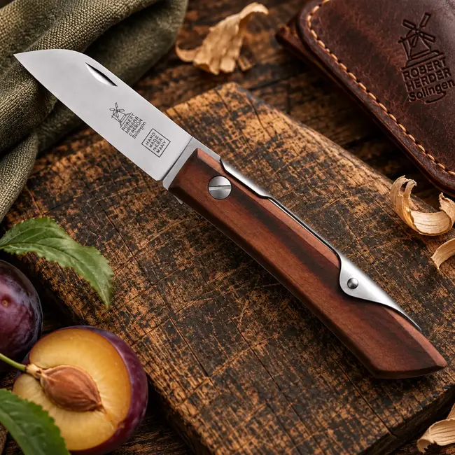 Robert Herder IBEX 60 S – Zakmes 60 mm – Carbonstaal - Pruimenhout – Slipjoint